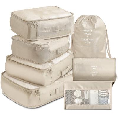 China Stocked 7 Pieces Storage Travel Bag Clothing Storage Bags Clothing Sets Universal Storage Bags for sale