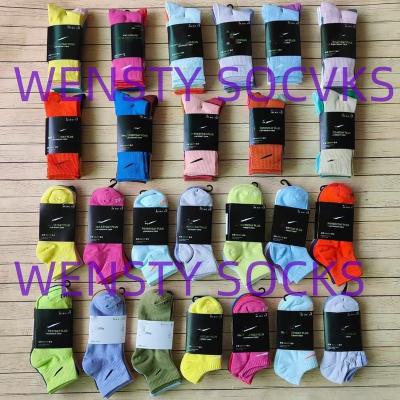 China Breathable New arrive high quality NK branded cotton socks unisex size gym sporty socks custom logo solid color training running socks for sale