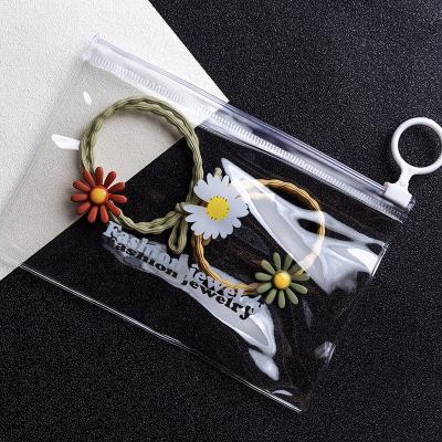 China Wholesale Custom New PVC Zipper Drawstring Bag Jewelry Daisy Moisture Proof Transparent Zipper Bag for sale