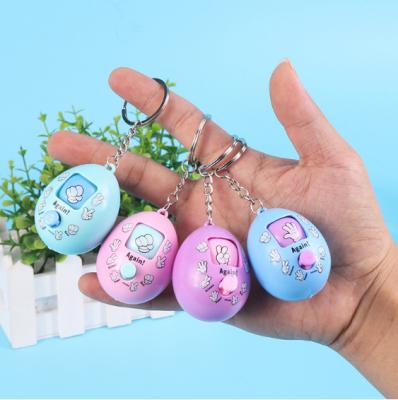 China Manufacturers Wholesale Guessing Key Chain Toy Pendant Egg Rock-Paper-Scissors Game 5.5*4cm for sale