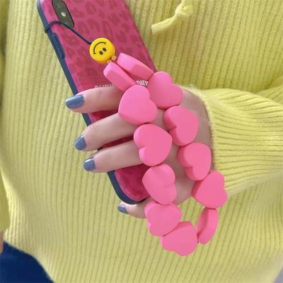 China European and American fashion pink armband phone strap phone chain colorful yellow smile phone Central Institute of Statistics big heart smile phone charm for sale