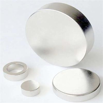 China Industrial Magnet N52 20mm Neodymium Round Thin Disc Sintered Rare Earth Magnets for sale