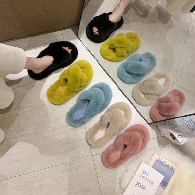 China Fashion Trend Women's Faux Fur Slippers Cross Fuzzy Slippers For Women Winter Bedroom Slippers for sale