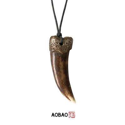 China Non Tarnish Aobao Necklace Natural Wolf Tooth Amulets And Talismans Couples Pendant Necklace For Women for sale