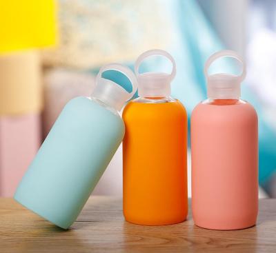 China 2022 Viable Hot Sale Customized Color And Logo High Quality Glass Water Bottle With Silicone Lid And Protective Sleeve For Outdoor for sale