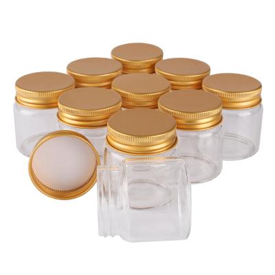 China Mini Small Glass Jar Storage Glass Packing Empty Honey Jars Custom Logo Transparent Bottle Glass for sale