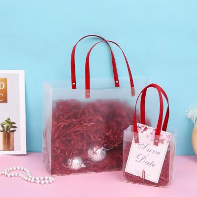 China Recyclable Custom Printed Transparent Tote Bags Shopping Bag Plastic Bag for sale