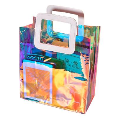 China Fashion \ large fashion PVC plastic bag tote bag wholesale comfortable \ durable clear beach bag laser cut PVC shopping bag for sale