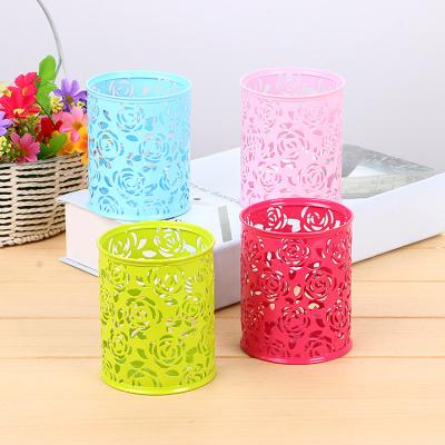 China Creative Pen Holder Cavity Rose Embroidered Metal Round Pen Holders For Notebook Student Stationery for sale