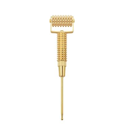 China New Arrival High Quality Anti-Puffiness Gold Studded Facial Roller Beauty Stick Face Oil Absorbing Metal Roller Gold Massager for sale