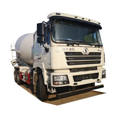 China Hotels Shacman Concrete Mixer Truck 390 Hp 6x4 Cement Mixing Truck Drive 10 CBM Right Left New Selfloading Customized for sale