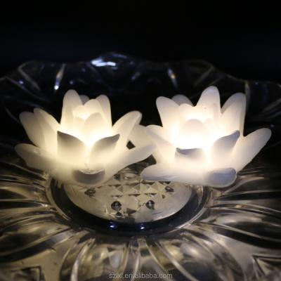 China Reusable LED Floating Battery Operated Warm White Color Floating Lotus Wax Candle Light Flameless Water Floating Candle for sale