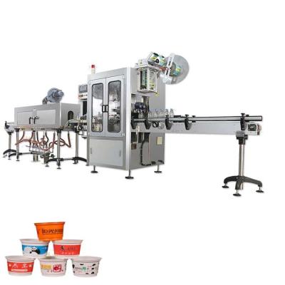 China Automatic water bottles shrink sleeve labeling machine with steam shrink tunnel and steam generator for sale