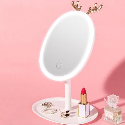 China Hit Touch Screen Cosmetic Folding LED Lighted Portable Makeup Mirror for sale