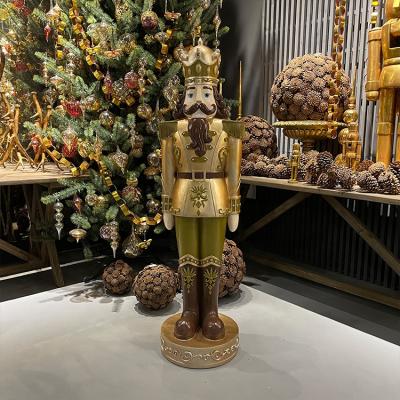 China Clever Christmas Decoration Toy Traditional Style Festive Resin Vintage Creations Nutcracker Golden Soldier for sale