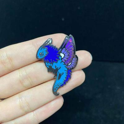 China Cheap North Ammerica Crossing Custom Animal Metal Baking Hard Enamel Glitter Glow Pin Hard Lapel Pin for sale