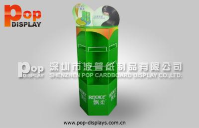 China Three-Sided Cosmetic Display Stands / Green Shampoo Floor Display With Compartments for sale