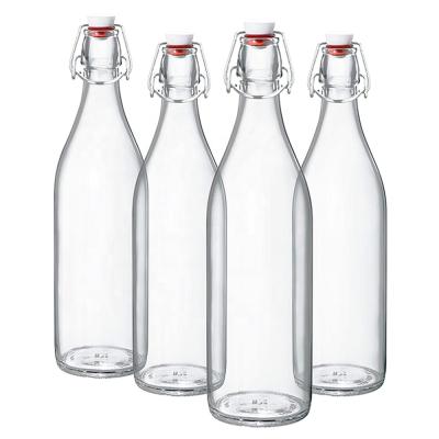 China 32 Ounce Eco-Friendly Clear Glass Beer Bottle With Cap, For Home Brewing, Rubber Sealed Storage for sale