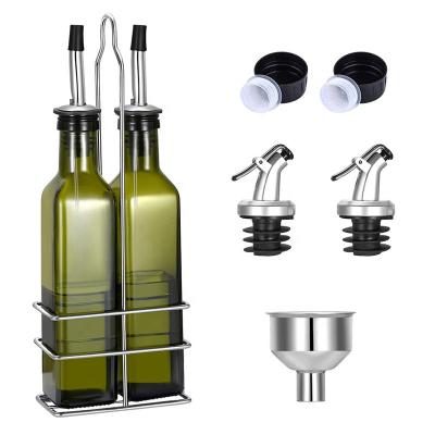 China Freshness keeping 17 oz glass bottle for oil or vinegar with stainless steel bracket, suitable for kitchen for sale