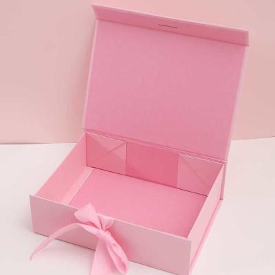 China Custom Recyclable Cardboard Gift Boxes With Magnetic Ribbon Folding Paper Box Packaging Magnetic Apparel Packaging Ribbon Luxury Gift Boxes for sale