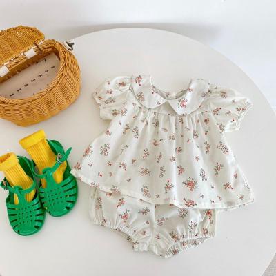 China Europe and America 2022 summer baby clothing set baby girl clothes nc floral short sleeve top + bread pants female baby 2 piece set for sale