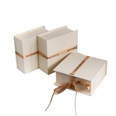 China High Quality Materials Custom White Rigid Magnetic Folding Gift Box Recycled Luxury Gift Box With Ribbon Bow for sale