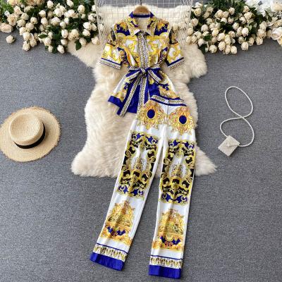 China Plus size hot sale 2021 plus size temperament and short sleeve shirt fashion two-piece set printed two-piece set wide leg pants women's clothing for sale