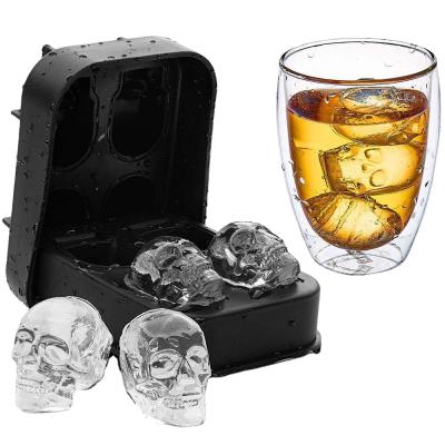 China Viable Hot Trays Amazon 4 Holes Skull Ice Tray Whiskey Drinks Ice Mold Silicone Ice Cube Moldes for sale