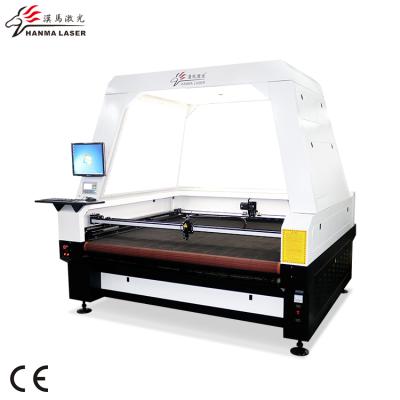 China Laser CUTTING widely used 1810 CCD vision laser cutting machine+ccd camera laser cutter for textile for sale