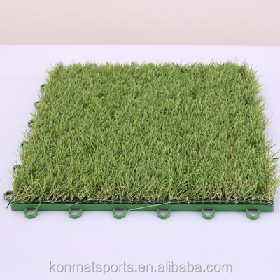 China Environmental friendly anti-slip puzzle artificial grass used for outdoor indoor and display flooring for sale