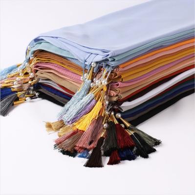 China Women Main High Quality Muslim Chiffon Scarf Hijab Wear Shawl Lady Pearl Tassel Simple Scarf for sale