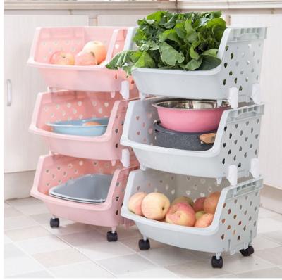 China Modern Layered Plastic Fruit Storage Basket Toy Storage Basket Bathroom Storage Rack With Wheels for sale