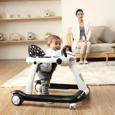 China Multifunctional baby toys walkers stroller baby walker anti-shake using music anti-o-leg folding children's walker for sale