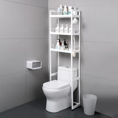 China Bathroom Waterproof Plastic Punch Free Floor Adjustable Toilet Storage Rack for sale