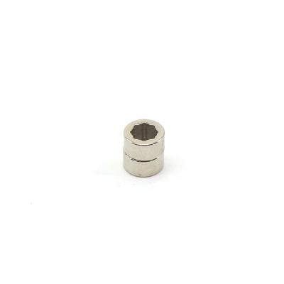 China Industrial magnet Xinqiang disc ndfeb magnet neodymium 25mm with screw hole for sale