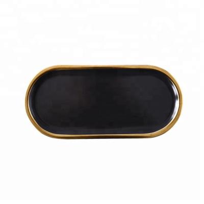 China Viable Nordic Black Ceramic Marble Tray Dessert Oval Plates with Gold Rim for sale