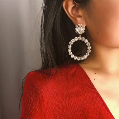 China FASHIONABLE drop shipping baroque style geometric circle hollow earrings women bead Diamond Temperament Pendant Earrings simple for sale