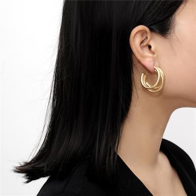 China FASHIONABLE Drop Shipping Multilayer Irregular Retro Hollow Out Matte Circle Metal Earrings C-Shaped Stud Earrings for sale