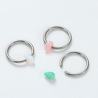 China Titanium Cool Conch Con Daith Piercing ASTM F136 CBR BCR Titanium Teardrop Spike Opal Captive Bead Rings for sale