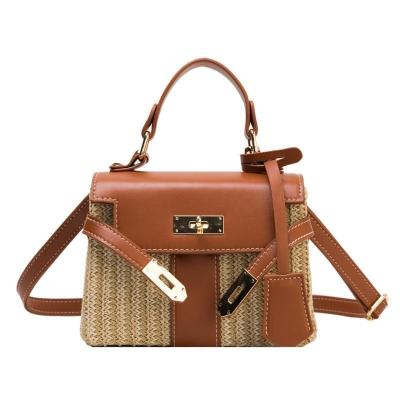 China 2022 Wholesale Eco-friendly Summer Handbags Beach Leisure Bamboo Clip Designer Style Straw Bag New for sale