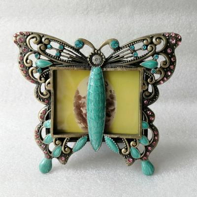 China Vintage Antique Bronze Plating with Green Enamel and Rose Rhinestones Hand Jeweled Butterfly Design Metal Alloy Table Picture Frame for sale