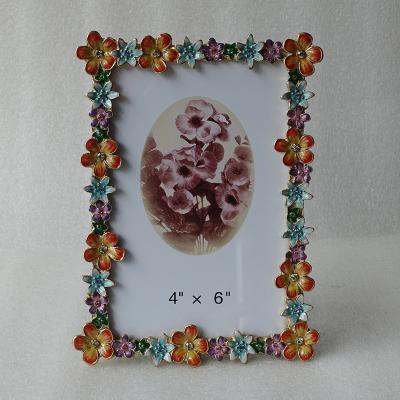 China Classic Shape Gold Rectangle Orange Blue Purple Hand Enameled And Jeweled Flowers 4 By 6 Metal Alloy Picture Table Photo Frame for sale