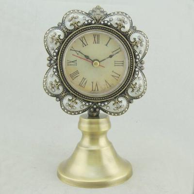 China Antique Style Antique Bronze With Pearl White Hand Enameled And Rhinestones Jeweled Round Metal Table Clock With Round Base for sale