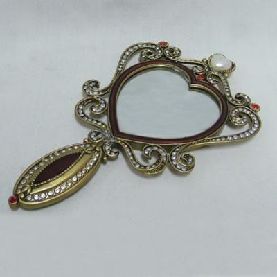 China Art Decor Antique Gold Burgundy Hand Enameled and Jeweled Heart Shape Zinc Alloy Framed Hand Held Mirror for sale