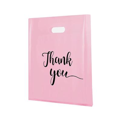 China Recyclable Pink Die Cut Handle Plastic Thank You Packaging Bag For Clothing And Shoes for sale