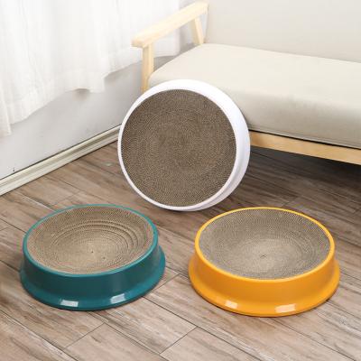 China Durable Fashion Round Cat Scratching Board Kitten Claws Scratcher Corrugated Scratch-Resistant Grinding Cat Bed for sale