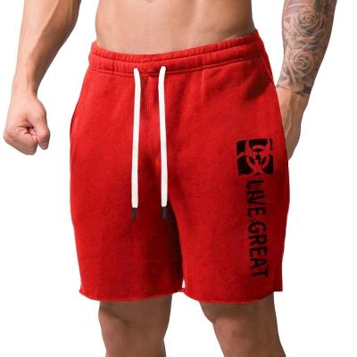 China Anti-wrinkle sports shorts men's fitness training clothes large size men's five-point pants running squat pants cotton for sale