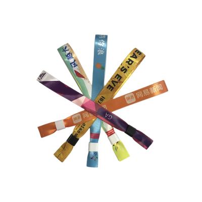 China Festival Environmental Friendly Promotional Cloth Woven Wristband , Printing Event Ribbon Wristband for sale