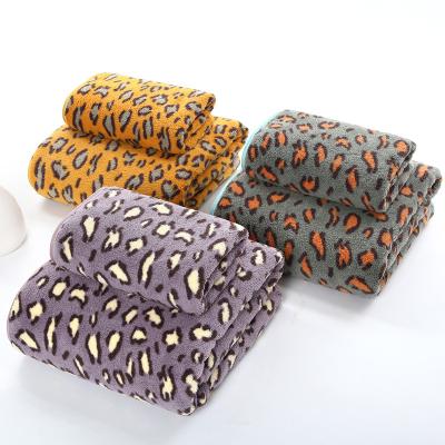 China Viable New Design Hot Sale Leopard Coral Fleece Bathroom Towel Sets Adult and Kids Bath Towel Set for sale