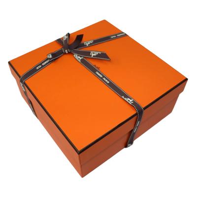 China Recycled Materials FUHING Custom Design Square Gift Lid And Raw Paper Box Packaging Orange Recyclable Art Paper Box With Bow Tie for sale